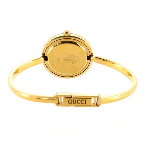 gucci interchangeable bezel bangle watch.